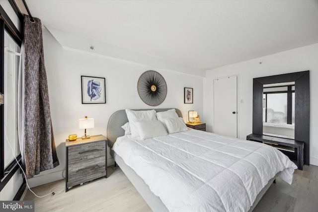 bedroom featuring light wood-type flooring