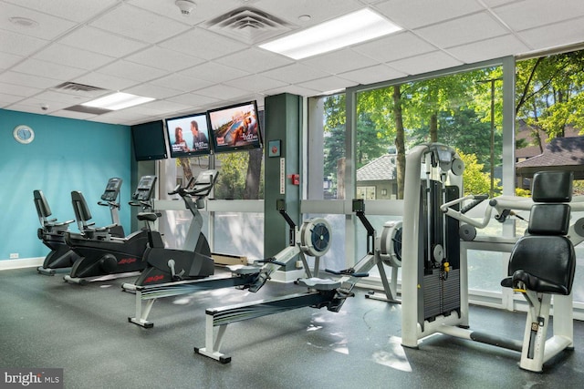 gym featuring a drop ceiling