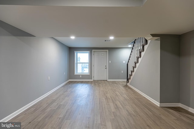 foyer with light hardwood / wood-style floors