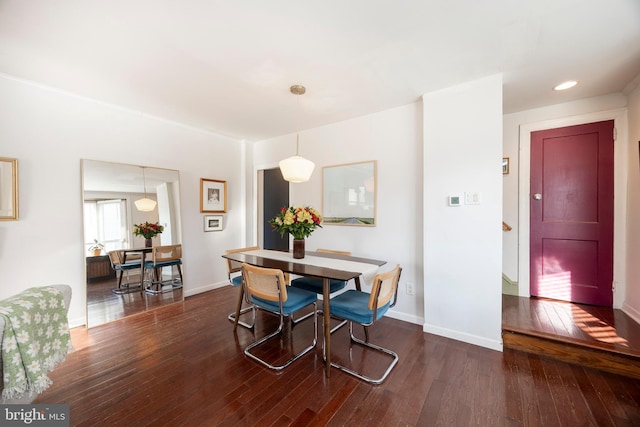 dining room featuring dark hardwood / wood-style flooring