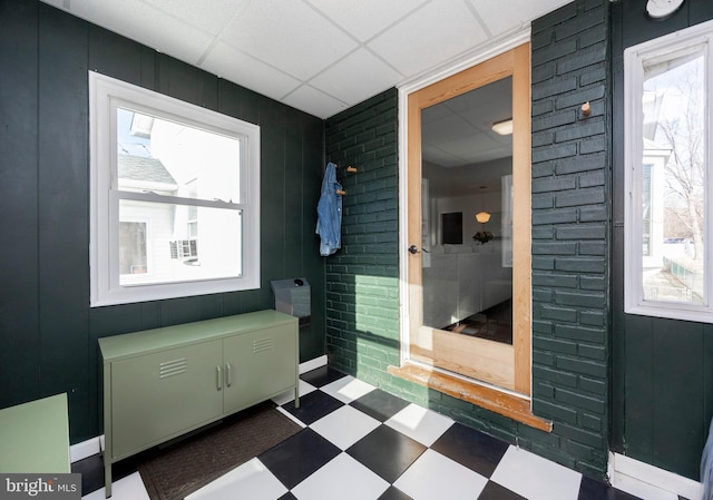 bathroom with a paneled ceiling