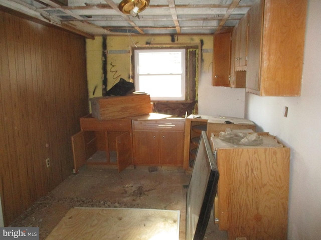 kitchen featuring brown cabinetry and light countertops