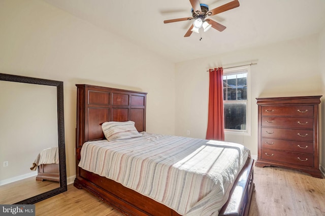 bedroom featuring ceiling fan and light hardwood / wood-style floors