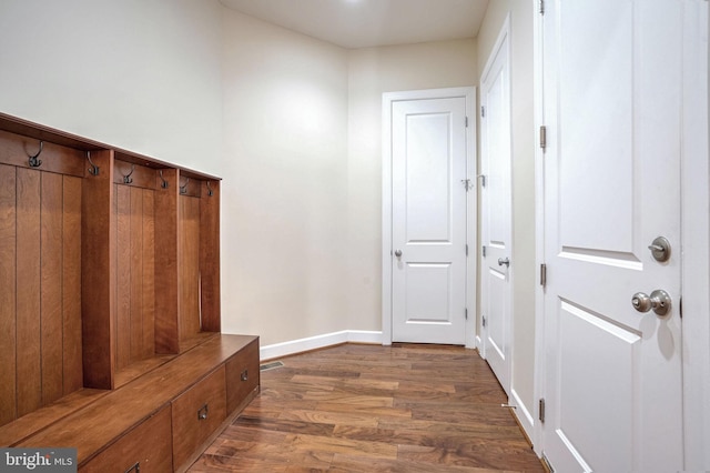 mudroom with dark hardwood / wood-style floors