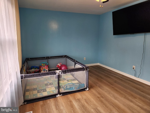 bedroom featuring hardwood / wood-style floors