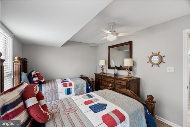 bedroom featuring ceiling fan and hardwood / wood-style flooring