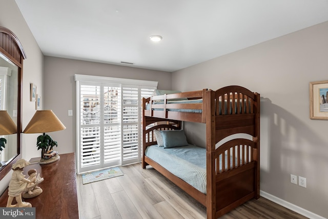 bedroom featuring light hardwood / wood-style floors