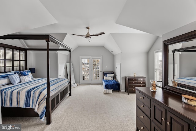 bedroom featuring ceiling fan, light carpet, and vaulted ceiling