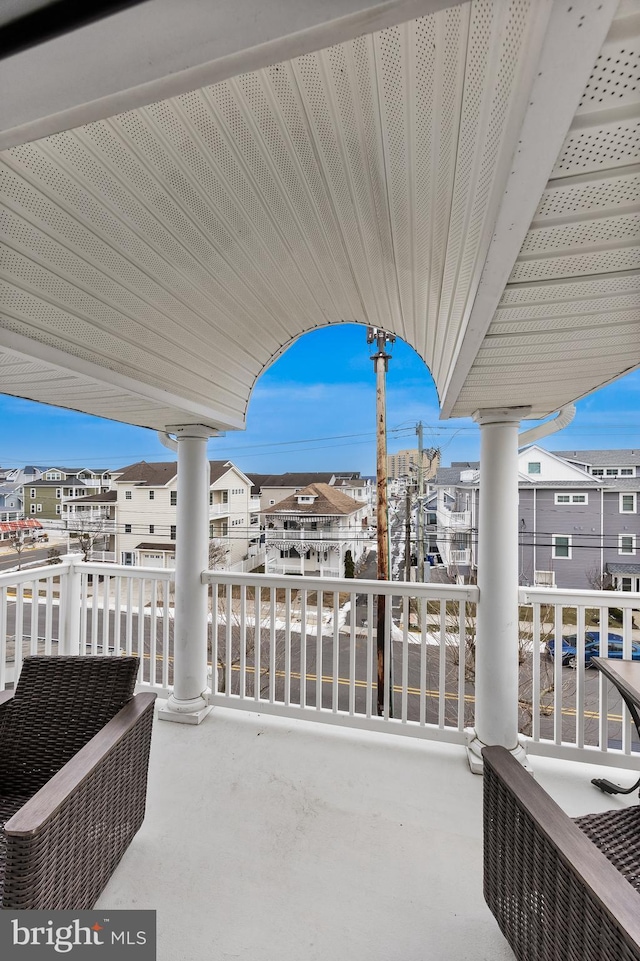 view of patio with a balcony