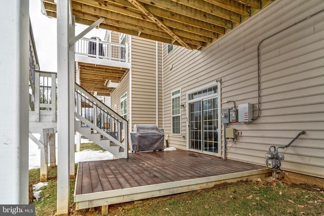 wooden deck featuring grilling area