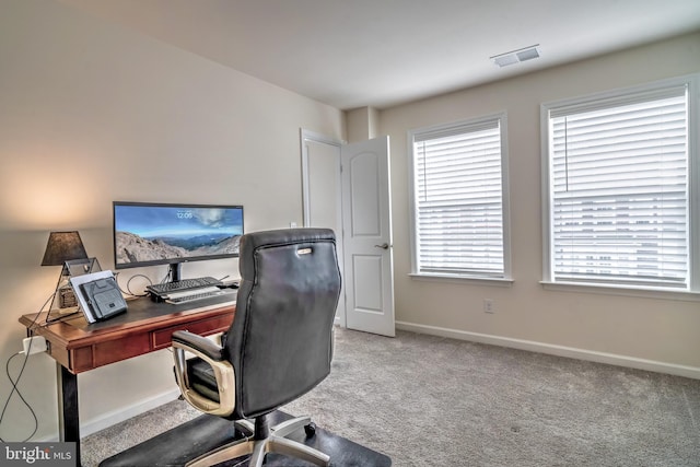 home office with light carpet