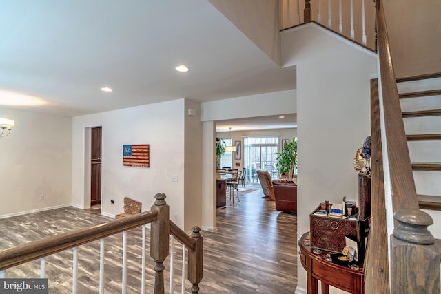 hallway featuring dark wood-type flooring