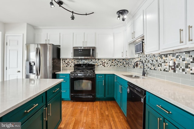 kitchen featuring black appliances, light wood-type flooring, sink, and white cabinetry