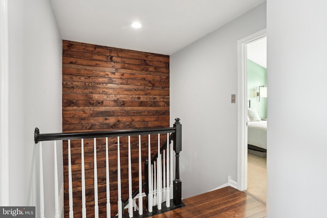 hall with dark hardwood / wood-style flooring