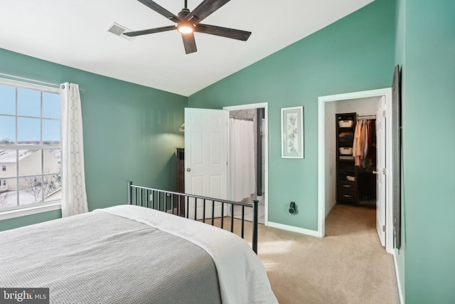 carpeted bedroom featuring ceiling fan and lofted ceiling