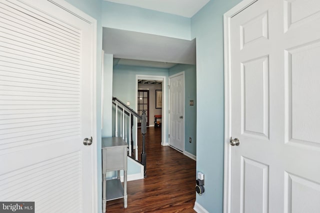 hallway featuring dark hardwood / wood-style floors