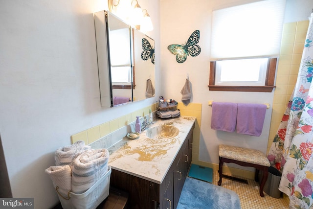 bathroom featuring tile patterned floors and vanity