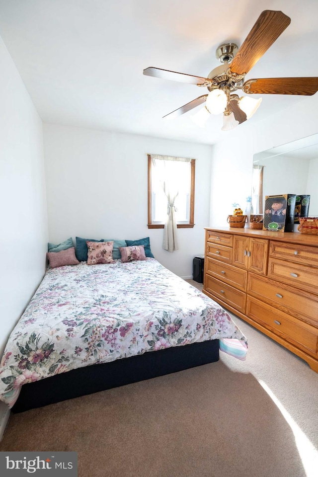 bedroom with carpet and ceiling fan