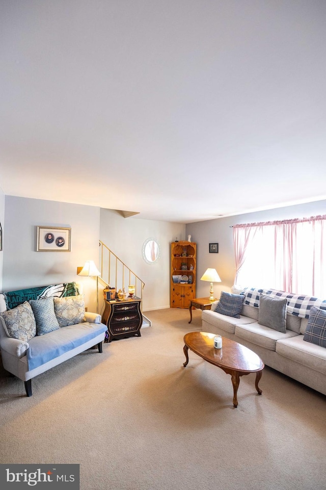 living room featuring carpet