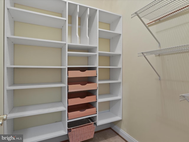 walk in closet featuring tile patterned floors