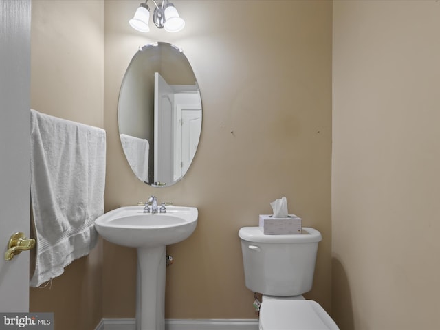 bathroom featuring toilet