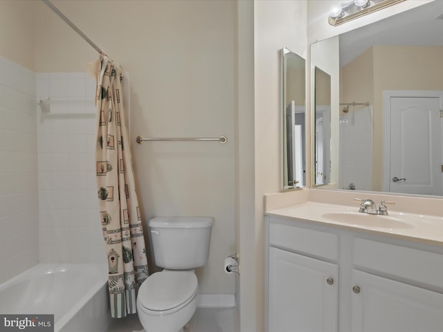 full bathroom with vanity, shower / tub combo with curtain, and toilet