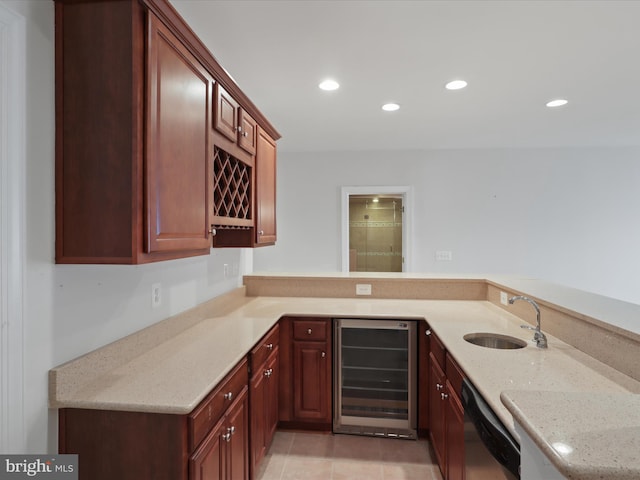 kitchen with wine cooler, sink, dishwashing machine, kitchen peninsula, and light stone countertops