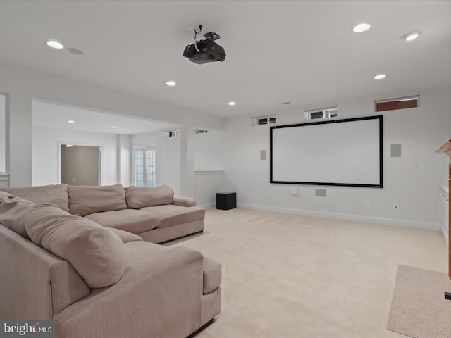 cinema room with light carpet