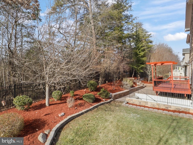 view of yard featuring a wooden deck