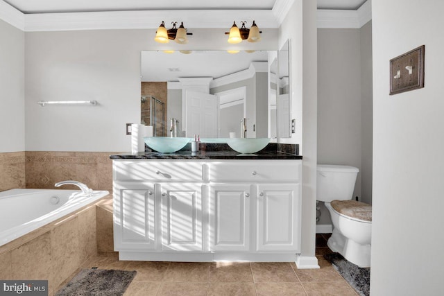 full bathroom featuring crown molding, vanity, toilet, and tile patterned flooring