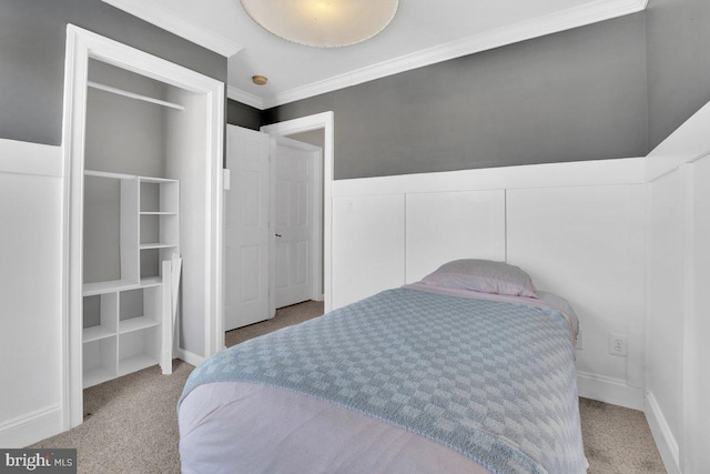 carpeted bedroom featuring ornamental molding