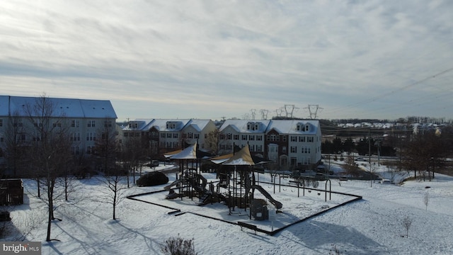 view of snow covered playground