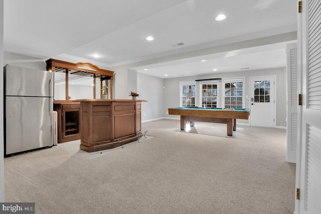 game room featuring ornamental molding, bar area, light carpet, pool table, and beverage cooler