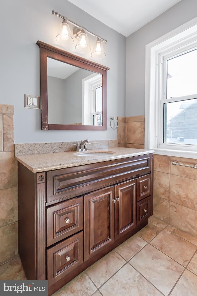 bathroom featuring tile patterned floors and vanity