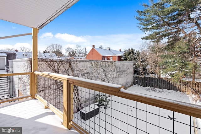 view of snow covered deck