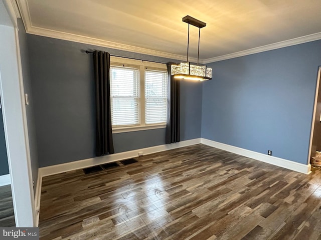 unfurnished room featuring crown molding and dark hardwood / wood-style floors