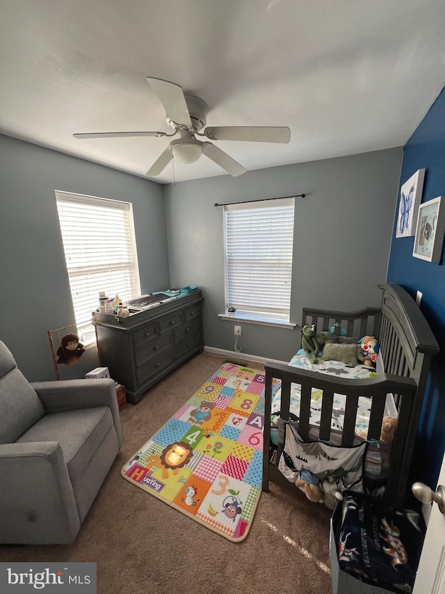 bedroom featuring carpet and ceiling fan