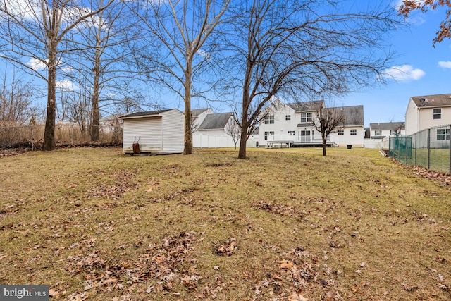 view of yard featuring a storage shed