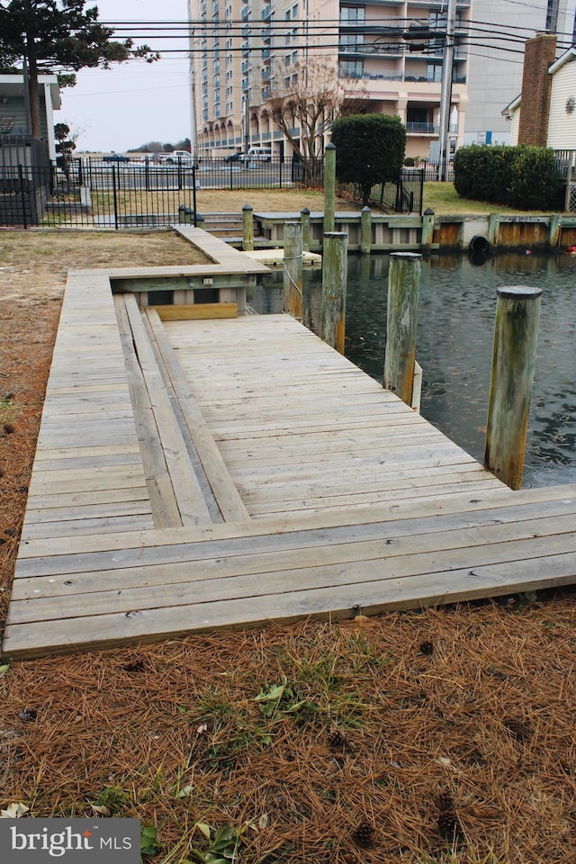 dock area featuring a water view