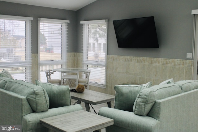 living room with lofted ceiling