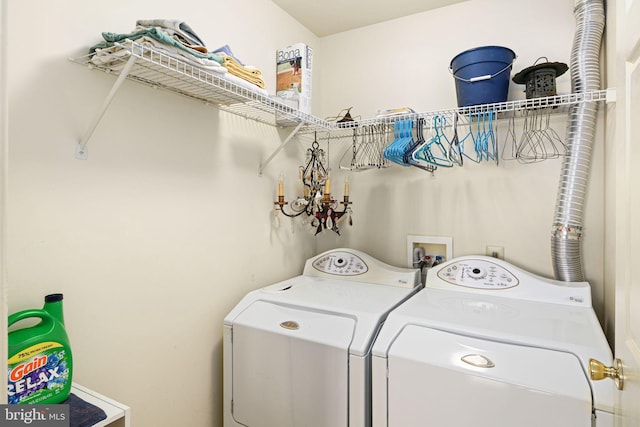 washroom featuring separate washer and dryer