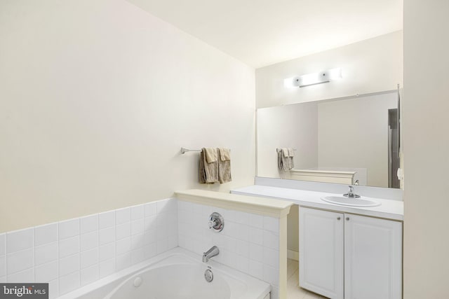 bathroom with vanity and a bathing tub