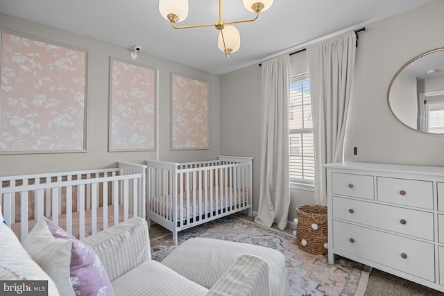 bedroom featuring a crib