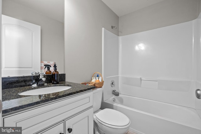 full bathroom with toilet,  shower combination, and vanity