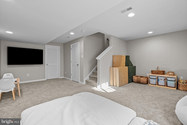 interior space featuring light colored carpet