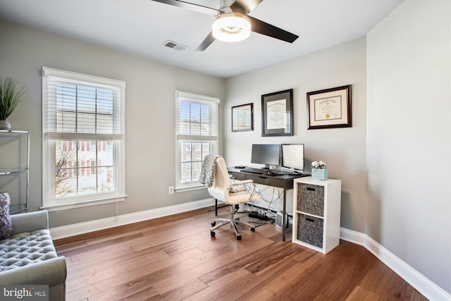 office area with hardwood / wood-style flooring and ceiling fan