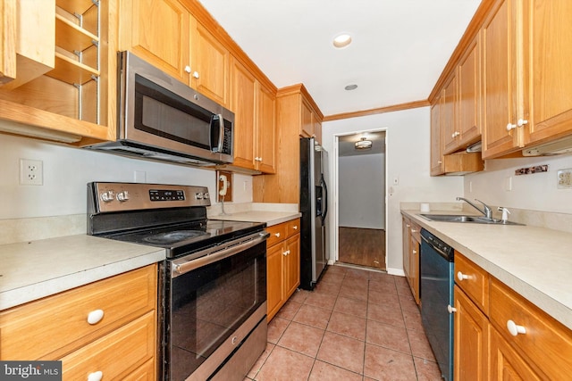 kitchen with light tile patterned floors, stainless steel appliances, ornamental molding, and sink