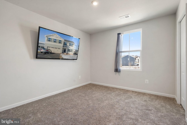 view of carpeted spare room