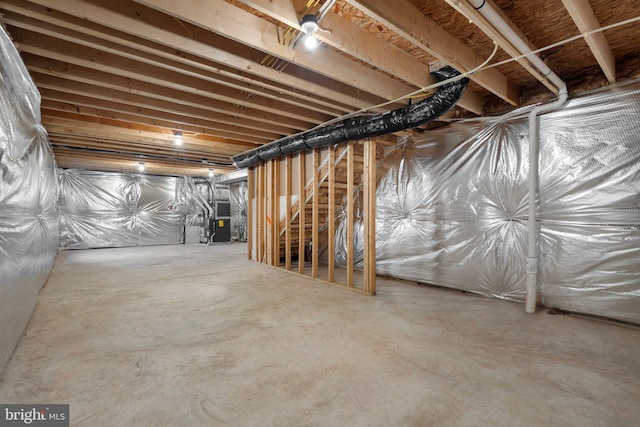 basement featuring heating unit