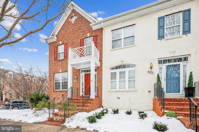 multi unit property featuring a balcony